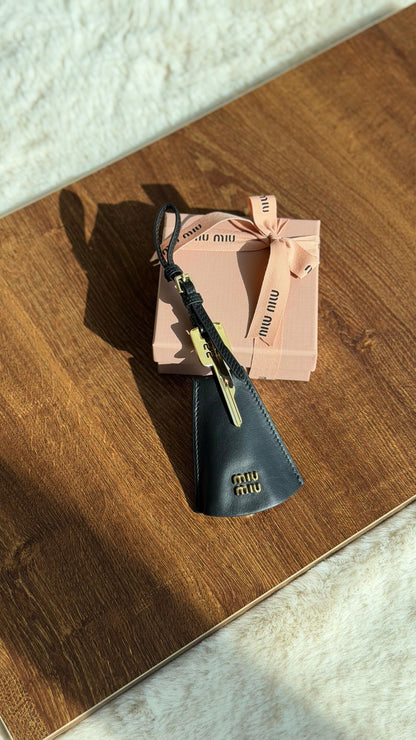 Miu Miu logo-lettering leather trick