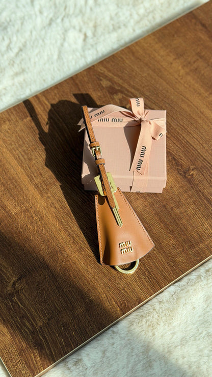 Miu Miu logo-lettering leather trick